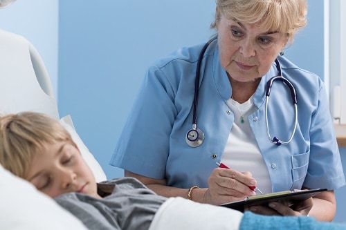 Sleep Medicine Doctor with young patient